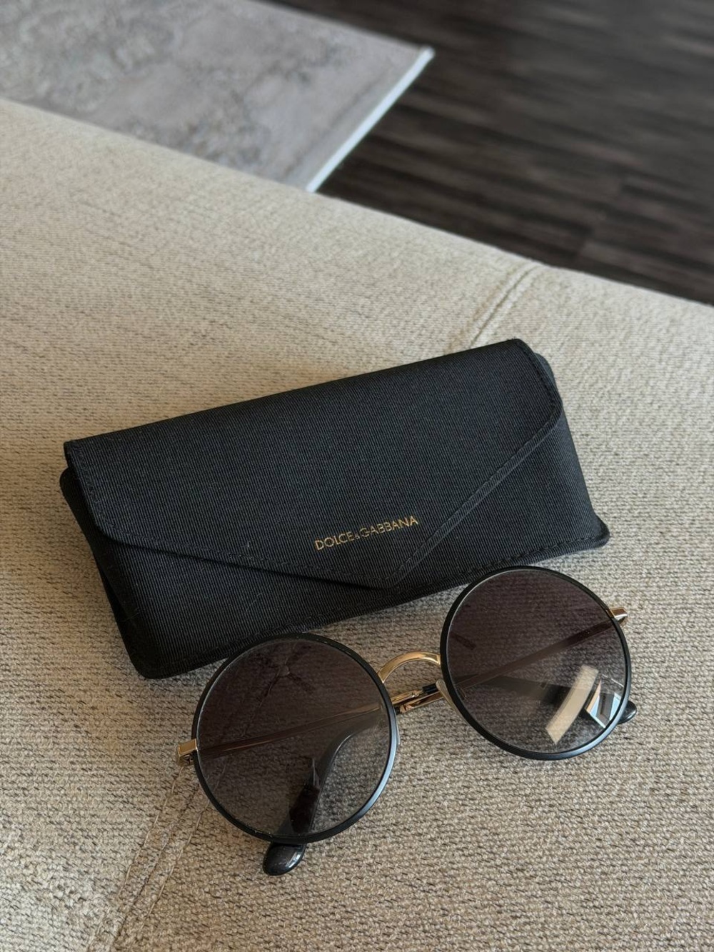 Dolce & Gabbana Black Round Sunglasses with Gold Accents